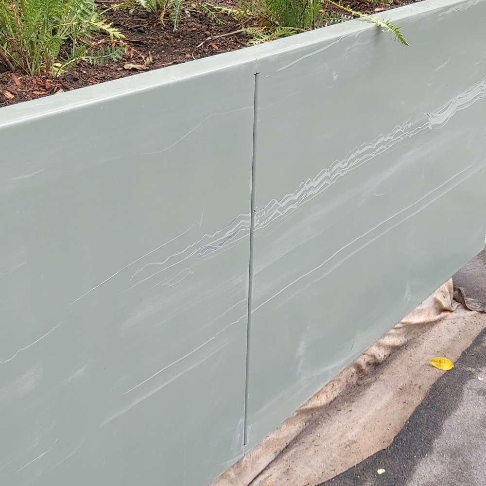 Before: Scuffed Sage Green Planter Panels Restored