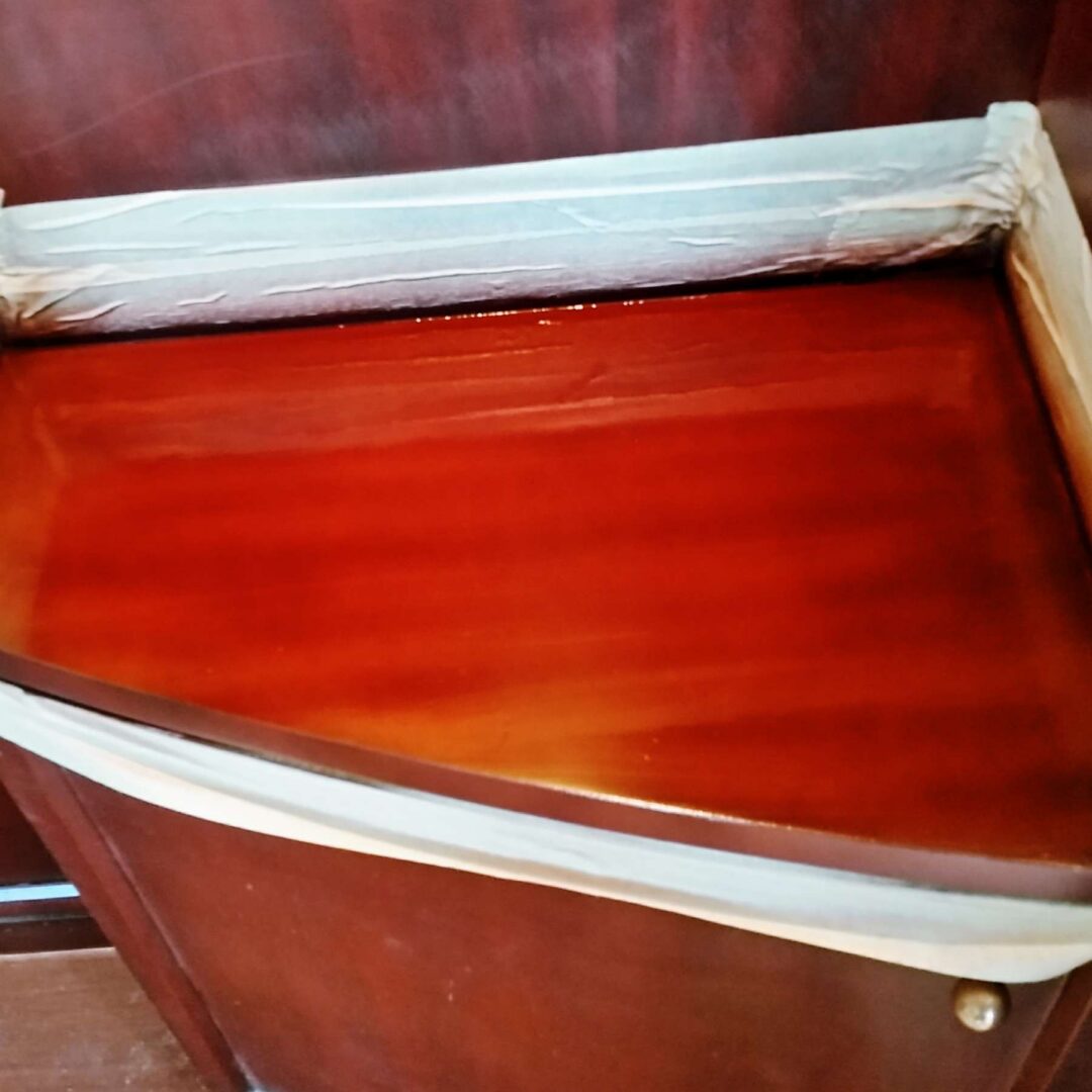 After: Paint-Splashed Mahogany Cabinet Top Restored